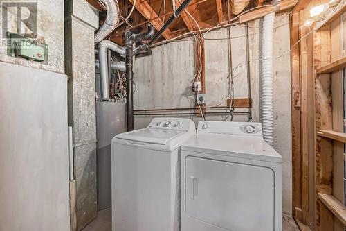 6303 Penbrooke Drive Se, Calgary, AB - Indoor Photo Showing Laundry Room