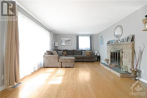 3205 Klondike Road W, Ottawa, ON - Indoor Photo Showing Living Room With Fireplace