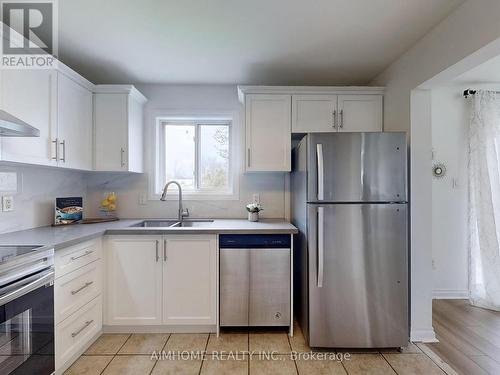 360 The Queensway S, Georgina, ON - Indoor Photo Showing Kitchen With Double Sink