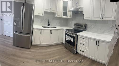 Bsmt - 23 Swamp Sparrow Court, Caledon, ON - Indoor Photo Showing Kitchen