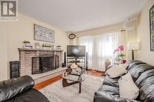 76 - 7080 Copenhagen Road, Mississauga (Meadowvale), ON - Indoor Photo Showing Living Room With Fireplace