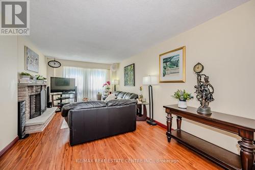 76 - 7080 Copenhagen Road, Mississauga (Meadowvale), ON - Indoor Photo Showing Living Room With Fireplace