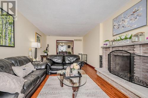 76 - 7080 Copenhagen Road, Mississauga, ON - Indoor Photo Showing Living Room With Fireplace