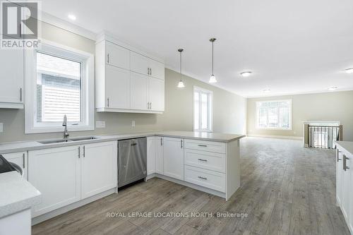 14 56Th Street S, Wasaga Beach, ON - Indoor Photo Showing Kitchen With Double Sink