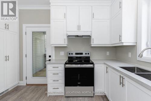 14 56Th Street S, Wasaga Beach, ON - Indoor Photo Showing Kitchen With Double Sink