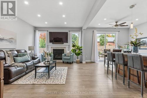 Put me in this one honey! - 3 Elliot Trail N, Thames Centre (Thorndale), ON - Indoor Photo Showing Living Room With Fireplace