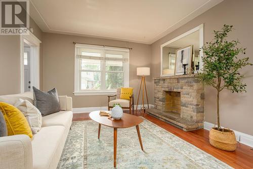 209 Weir Street N, Hamilton, ON - Indoor Photo Showing Living Room With Fireplace