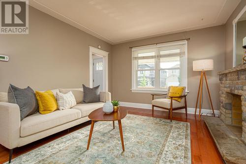 209 Weir Street N, Hamilton (Homeside), ON - Indoor Photo Showing Living Room With Fireplace