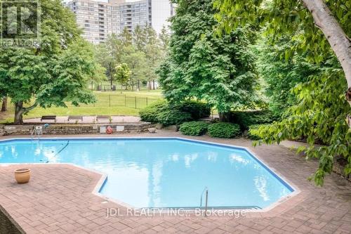 942 - 25 Bamburgh Circle, Toronto (Steeles), ON - Outdoor With In Ground Pool With Backyard