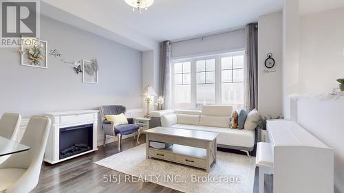 21 Barley Lane, Hamilton (Meadowlands), ON - Indoor Photo Showing Living Room With Fireplace