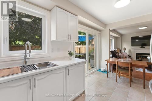 83 Rockhaven Lane, Hamilton (Waterdown), ON - Indoor Photo Showing Kitchen With Fireplace