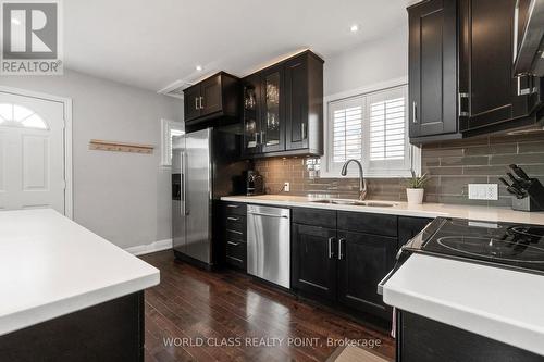 9 Thirty Second Street, Toronto, ON - Indoor Photo Showing Kitchen With Double Sink