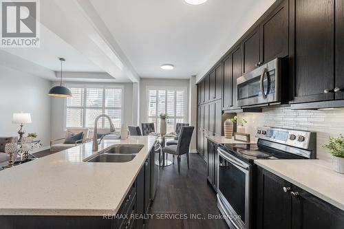 91 Maple Cider Street, Caledon, ON - Indoor Photo Showing Kitchen With Double Sink With Upgraded Kitchen