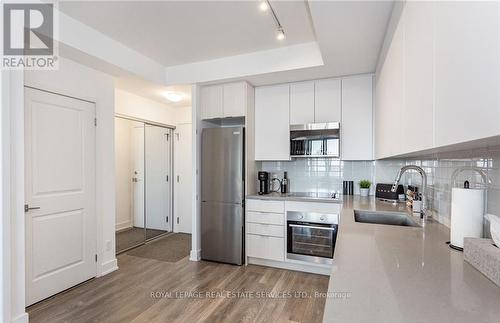 1302 - 297 Oak Walk Drive, Oakville (Uptown Core), ON - Indoor Photo Showing Kitchen With Stainless Steel Kitchen