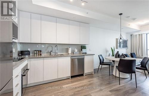 1302 - 297 Oak Walk Drive, Oakville (Uptown Core), ON - Indoor Photo Showing Kitchen With Stainless Steel Kitchen