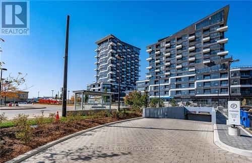 1302 - 297 Oak Walk Drive, Oakville, ON - Outdoor With Balcony With Facade