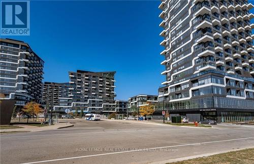 1302 - 297 Oak Walk Drive, Oakville, ON - Outdoor With Facade