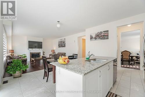 36 Lowell Crescent, Brampton, ON - Indoor Photo Showing Kitchen With Fireplace With Double Sink