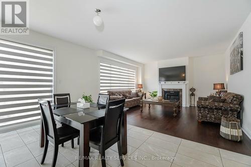 36 Lowell Crescent, Brampton, ON - Indoor Photo Showing Dining Room With Fireplace