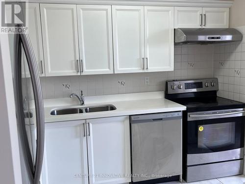 1811 - 3590 Kaneff Crescent, Mississauga, ON - Indoor Photo Showing Kitchen With Double Sink