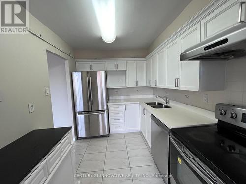 1811 - 3590 Kaneff Crescent, Mississauga, ON - Indoor Photo Showing Kitchen With Double Sink