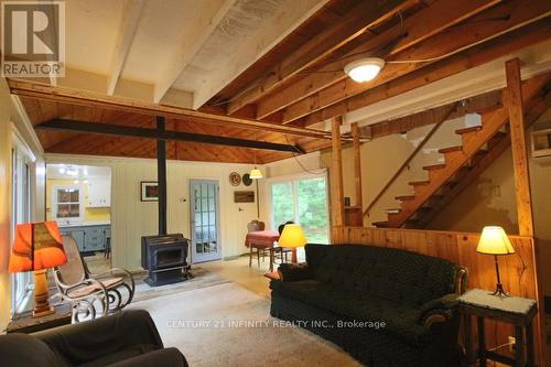 52 Lake St Peter Road, Hastings Highlands, ON - Indoor Photo Showing Other Room With Fireplace