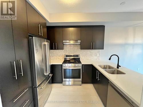 166 - 1890 Rymal Road E, Hamilton, ON - Indoor Photo Showing Kitchen With Stainless Steel Kitchen With Double Sink With Upgraded Kitchen