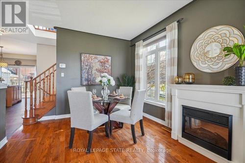 4 Cardiff Lane, Hamilton (Winona Park), ON - Indoor Photo Showing Dining Room With Fireplace