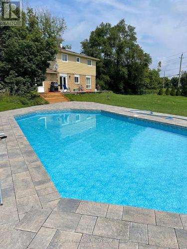 3 Simon Drive E, Adjala-Tosorontio, ON - Outdoor With In Ground Pool With Backyard