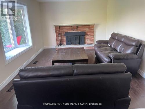 3 Simon Drive E, Adjala-Tosorontio, ON - Indoor Photo Showing Living Room With Fireplace