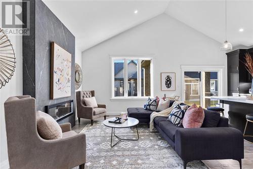 392 Matese, Lakeshore, ON - Indoor Photo Showing Living Room With Fireplace