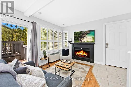 510 - 796468 19 Grey Road, Blue Mountains, ON - Indoor Photo Showing Living Room With Fireplace