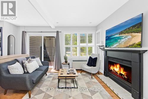 510 - 796468 19 Grey Road, Blue Mountains, ON - Indoor Photo Showing Living Room With Fireplace