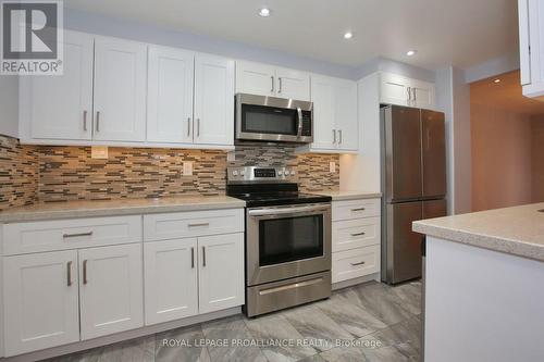 1604 - 3151 Bridletowne Circle, Toronto (L'Amoreaux), ON - Indoor Photo Showing Kitchen With Stainless Steel Kitchen With Upgraded Kitchen