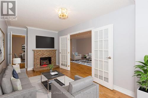 1604 - 3151 Bridletowne Circle, Toronto (L'Amoreaux), ON - Indoor Photo Showing Living Room With Fireplace