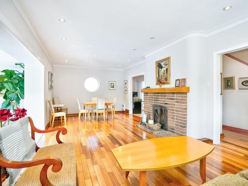 Living room - 12220 Ch. De Somerset, Montréal (Ahuntsic-Cartierville), QC - Indoor Photo Showing Other Room With Fireplace