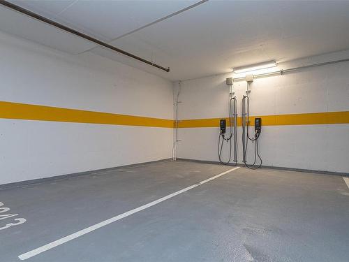 704-2000 Hannington Rd, Langford, BC - Indoor Photo Showing Garage