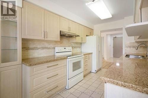 203 - 2100 John Street, Markham, ON - Indoor Photo Showing Kitchen With Double Sink