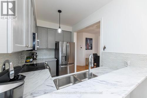 9 Pendulum Circle, Brampton, ON - Indoor Photo Showing Kitchen With Stainless Steel Kitchen With Double Sink With Upgraded Kitchen