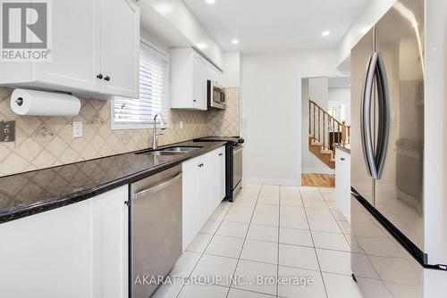 6207 Mccracken Drive, Mississauga, ON - Indoor Photo Showing Kitchen With Stainless Steel Kitchen With Double Sink