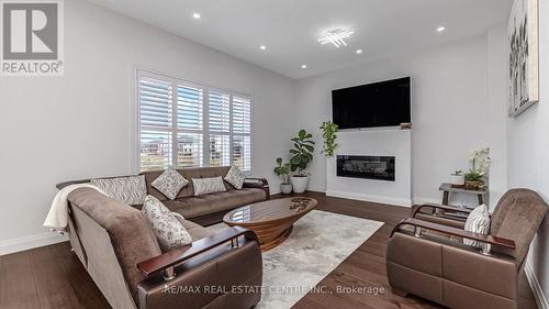 64 Grandville Circle, Brant, ON - Indoor Photo Showing Living Room With Fireplace