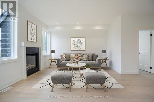 161 Pike Creek Drive, Haldimand, ON - Indoor Photo Showing Living Room With Fireplace