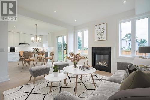 161 Pike Creek Drive, Haldimand, ON - Indoor Photo Showing Living Room With Fireplace