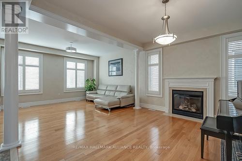 2452 North Ridge Trail, Oakville, ON - Indoor Photo Showing Living Room With Fireplace