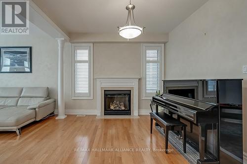 2452 North Ridge Trail, Oakville, ON - Indoor Photo Showing Living Room With Fireplace