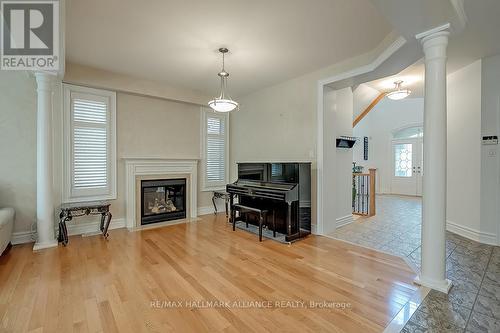 2452 North Ridge Trail, Oakville, ON - Indoor Photo Showing Living Room With Fireplace