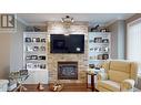 100 1702 Dyke Road, Quesnel, BC  - Indoor Photo Showing Living Room With Fireplace 