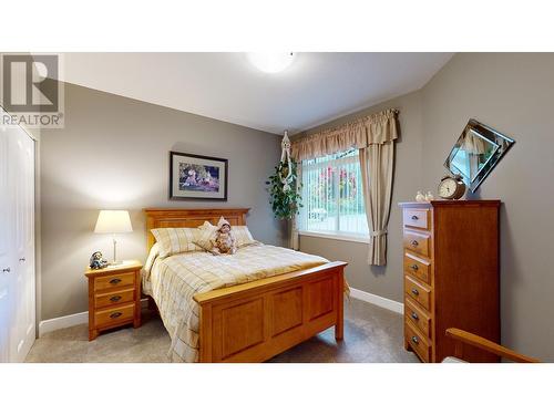 100 1702 Dyke Road, Quesnel, BC - Indoor Photo Showing Bedroom