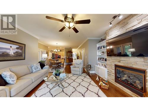 100 1702 Dyke Road, Quesnel, BC - Indoor Photo Showing Living Room With Fireplace