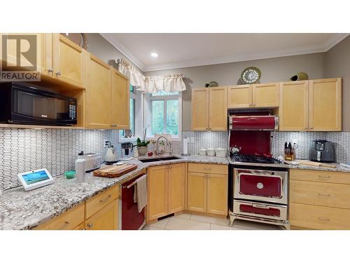 100 1702 Dyke Road, Quesnel, BC - Indoor Photo Showing Kitchen